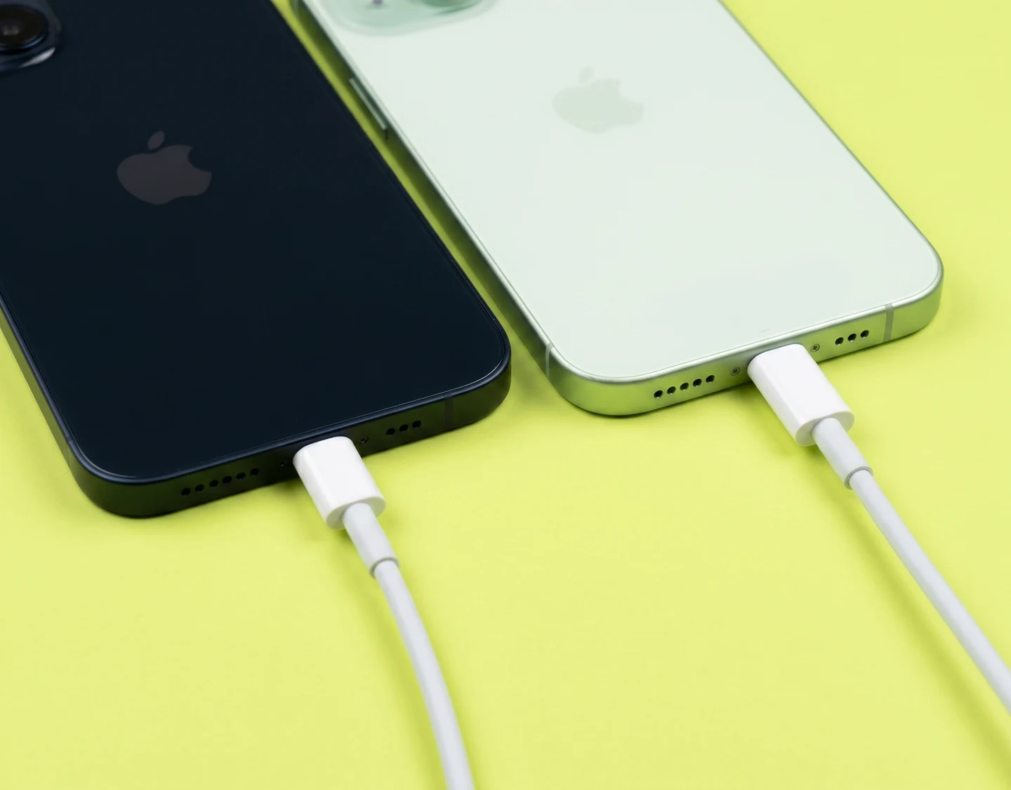 Lightning and USB-C charging ports on the iPhone 14 Plus and iPhone 15 Plus, respectively.