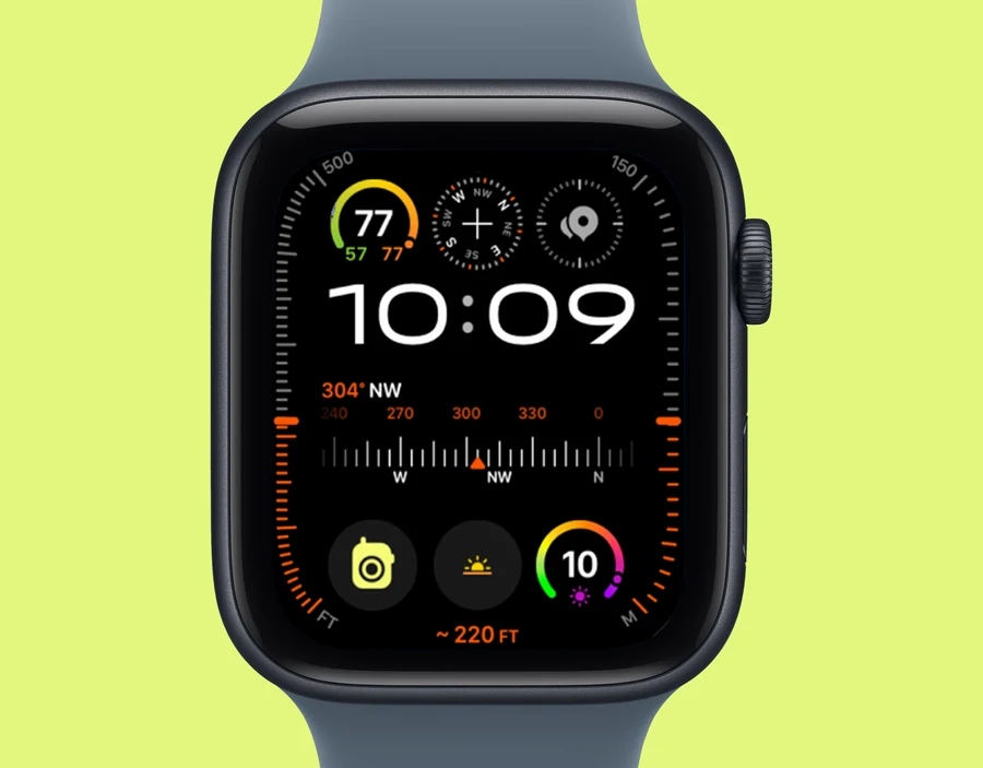 A close-up view of the Apple Watch SE 3 watch face displaying time and widgets.