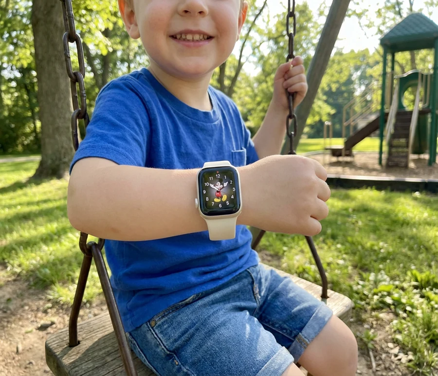 Picture of a young child wearing an Apple Watch SE 2